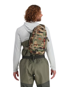 Simms Tributary Sling Pack Woodland Camo  Sonderpreis, nur solange unser Vorrat reicht!